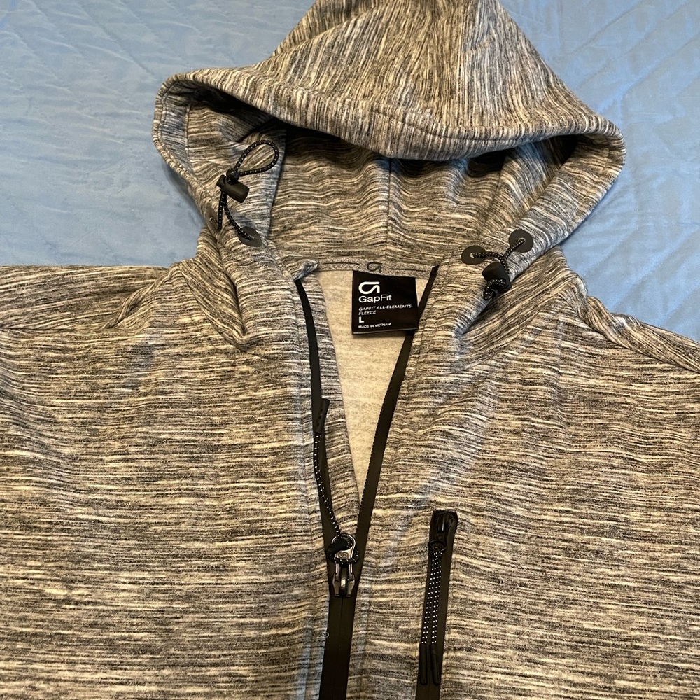 Gap Fit Men’s Tech hooded jacket.  Great condition